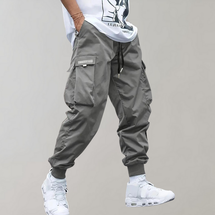 Alpenfeld | Herren Cargo Jogginghose – Lila Streetwear-Hose mit Reißverschlusstaschen & Bündchen